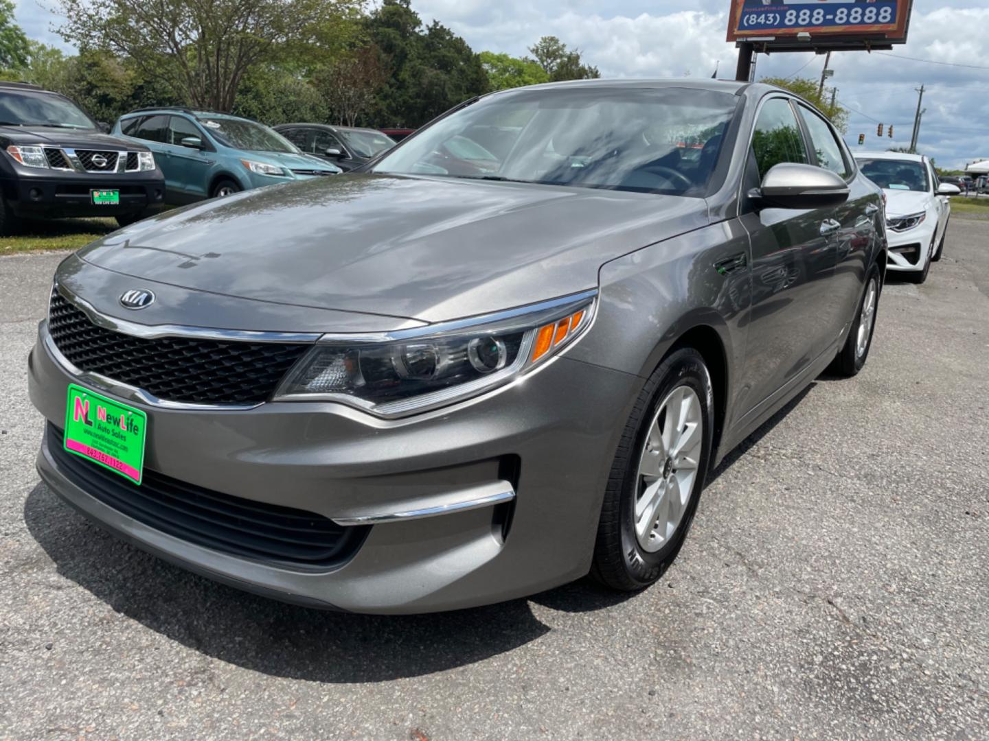 2018 GRAY KIA OPTIMA LX (5XXGT4L34JG) with an 2.4L engine, Automatic transmission, located at 5103 Dorchester Rd., Charleston, SC, 29418-5607, (843) 767-1122, 36.245171, -115.228050 - Roomy Interior with AUX/USB/Sat/Bluetooth, Power Windows, Power Locks, Power Mirrors, Backup Camera, Keyless Entry, Alloy Wheels. 118k miles Located at New Life Auto Sales! 2023 WINNER for Post & Courier's Charleston's Choice Pre-owned Car Dealer AND 2018-2024 Top 5 Finalist for Charleston City Pap - Photo#2